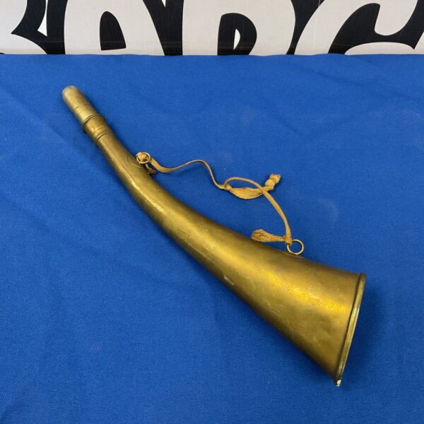 Antique brass signalling horn by Kohler & Son, side view.