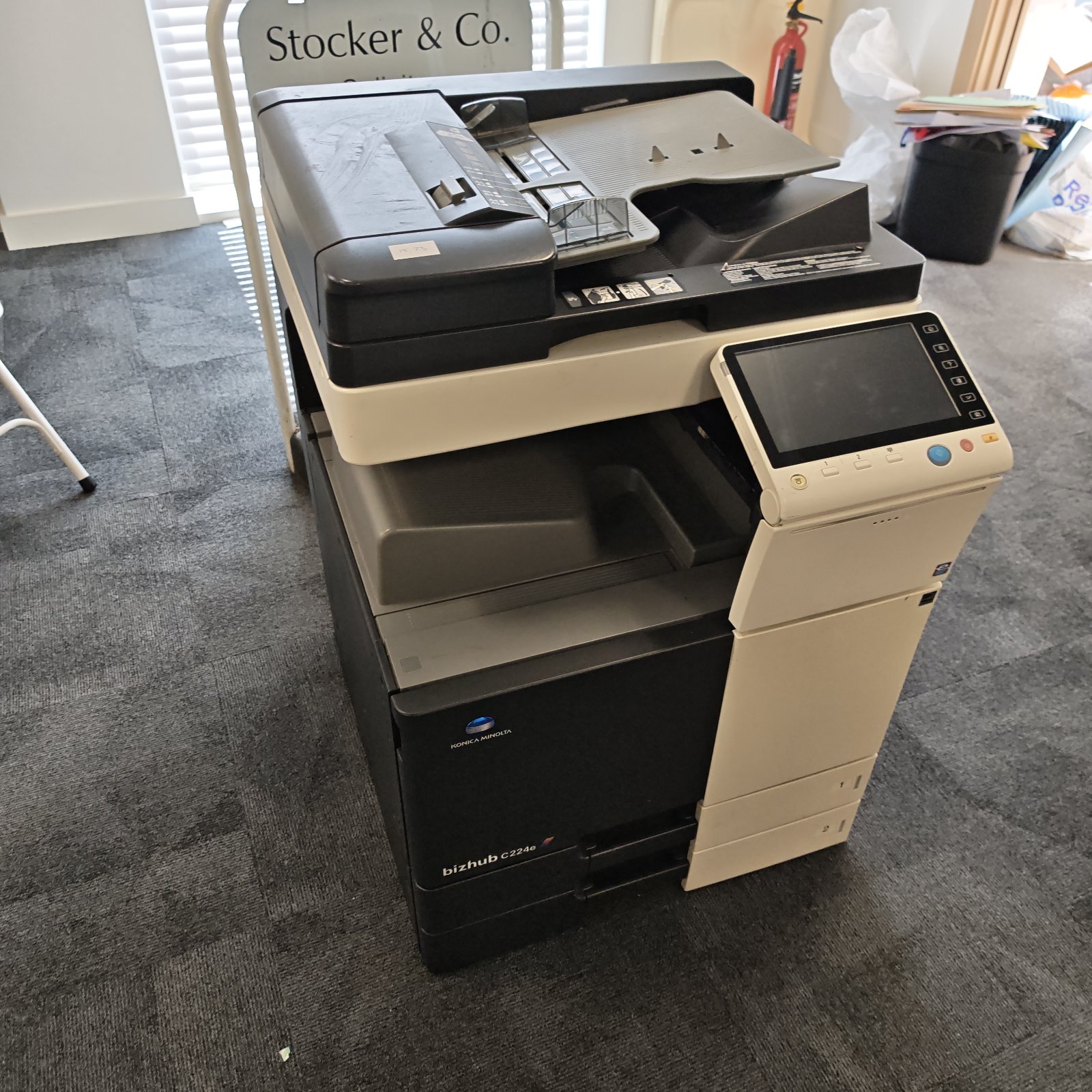 Large Konica Minolta bizhub office printer scanner for document management.