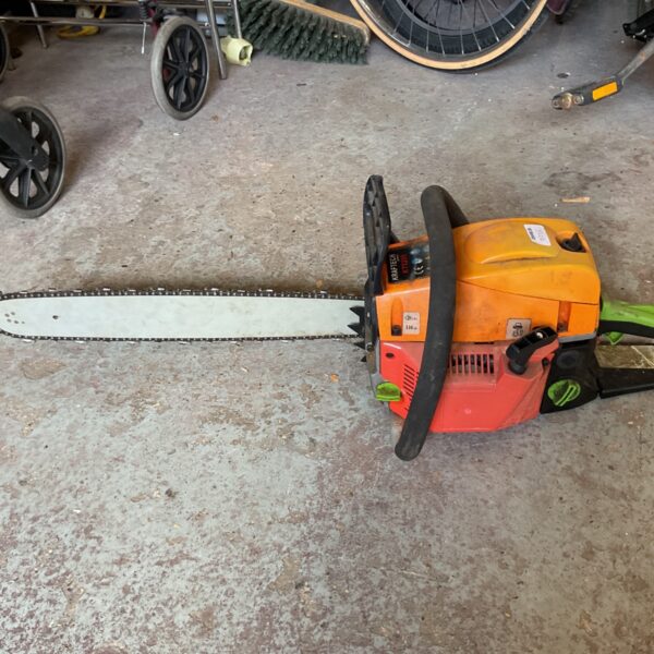 Orange Kraftech KT5200 petrol chainsaw for garden and DIY tasks.