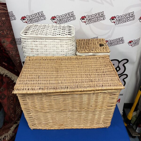 Woven laundry baskets, including a JVL acacia willow set, for storage.