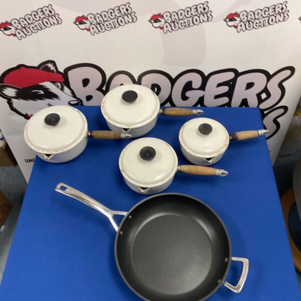 Le Creuset frying pan, enamel cast iron kitchenware.