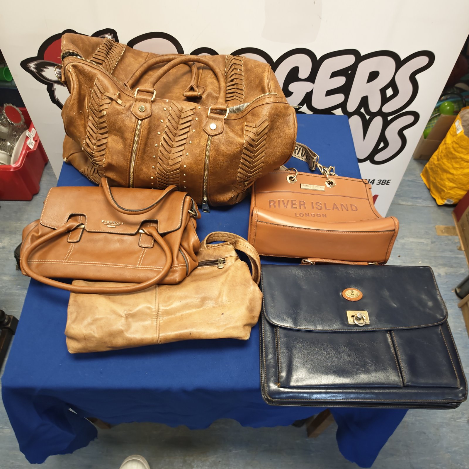 Bundle of brown leather handbags including River Island and Fiorelli.