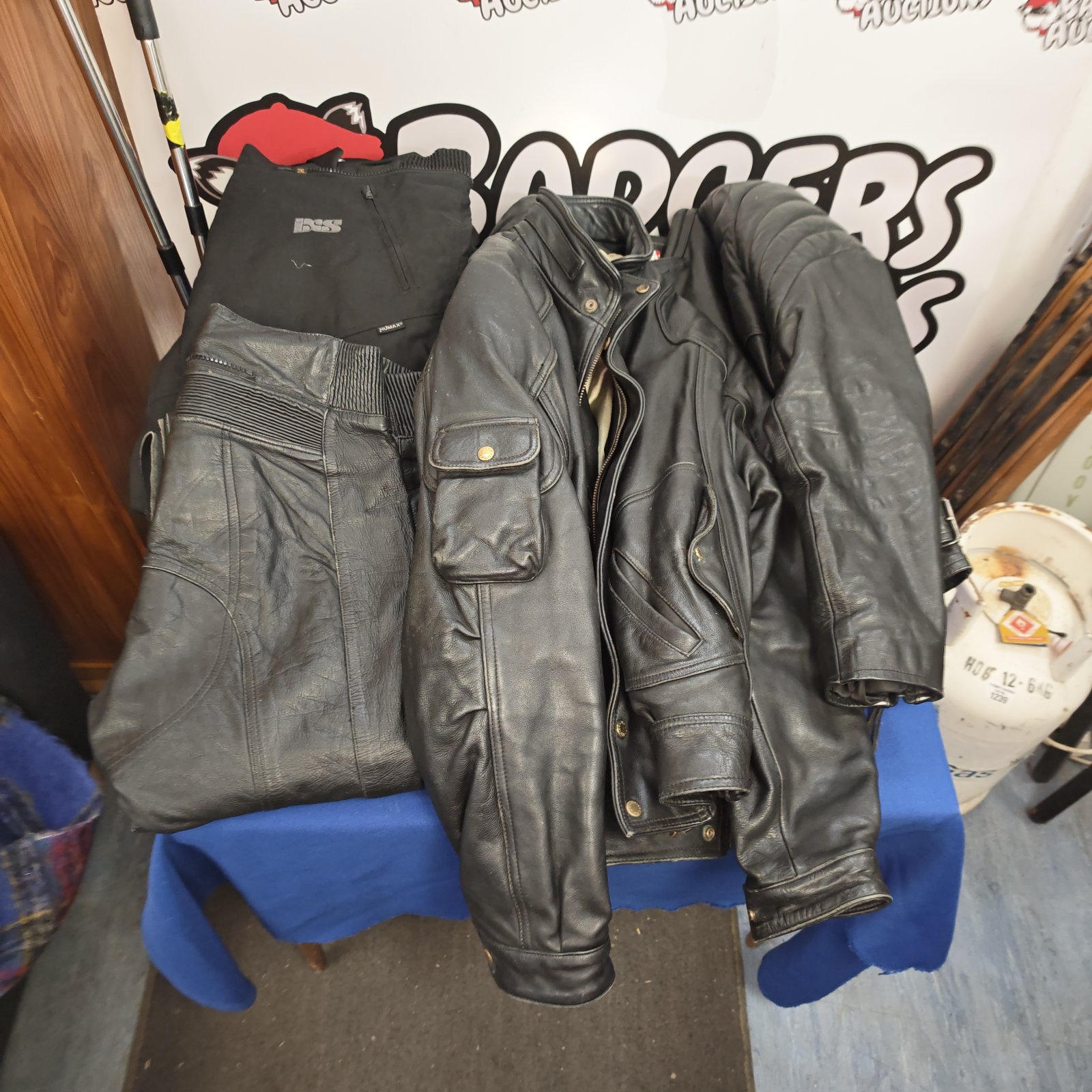 Leather motorcycle jackets and trousers lot for sale.