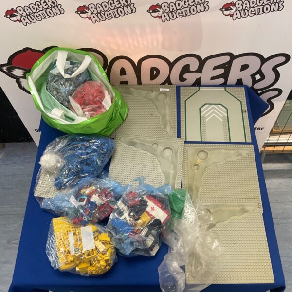 Assorted Lego pieces and boards in a colourful collection.