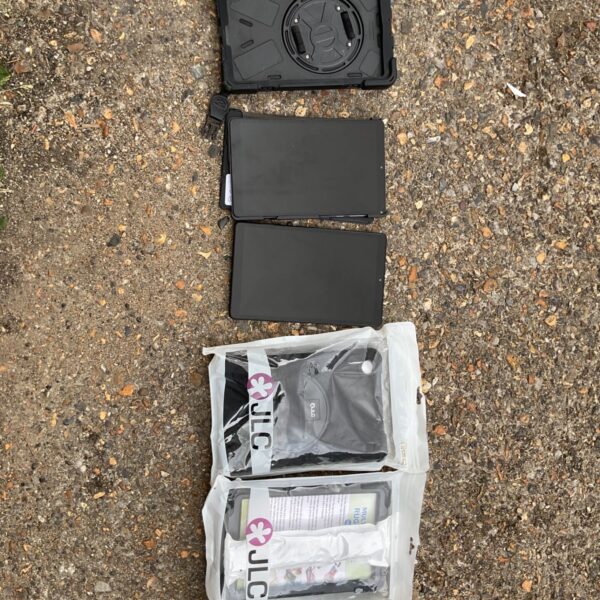 Lenovo tablets with protective cases in a lot.