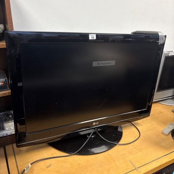 LG 37LG5000 HD TV with remote control, black flat screen.