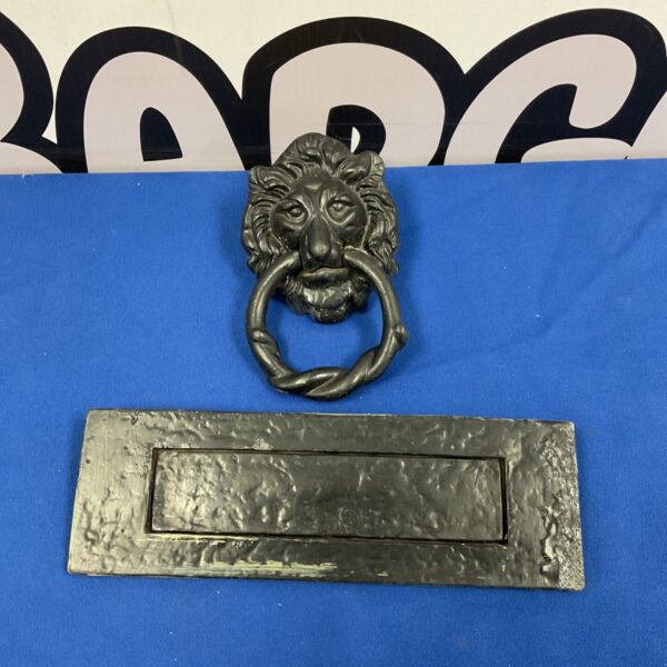 Vintage cast iron lionhead door knocker and letterbox set.
