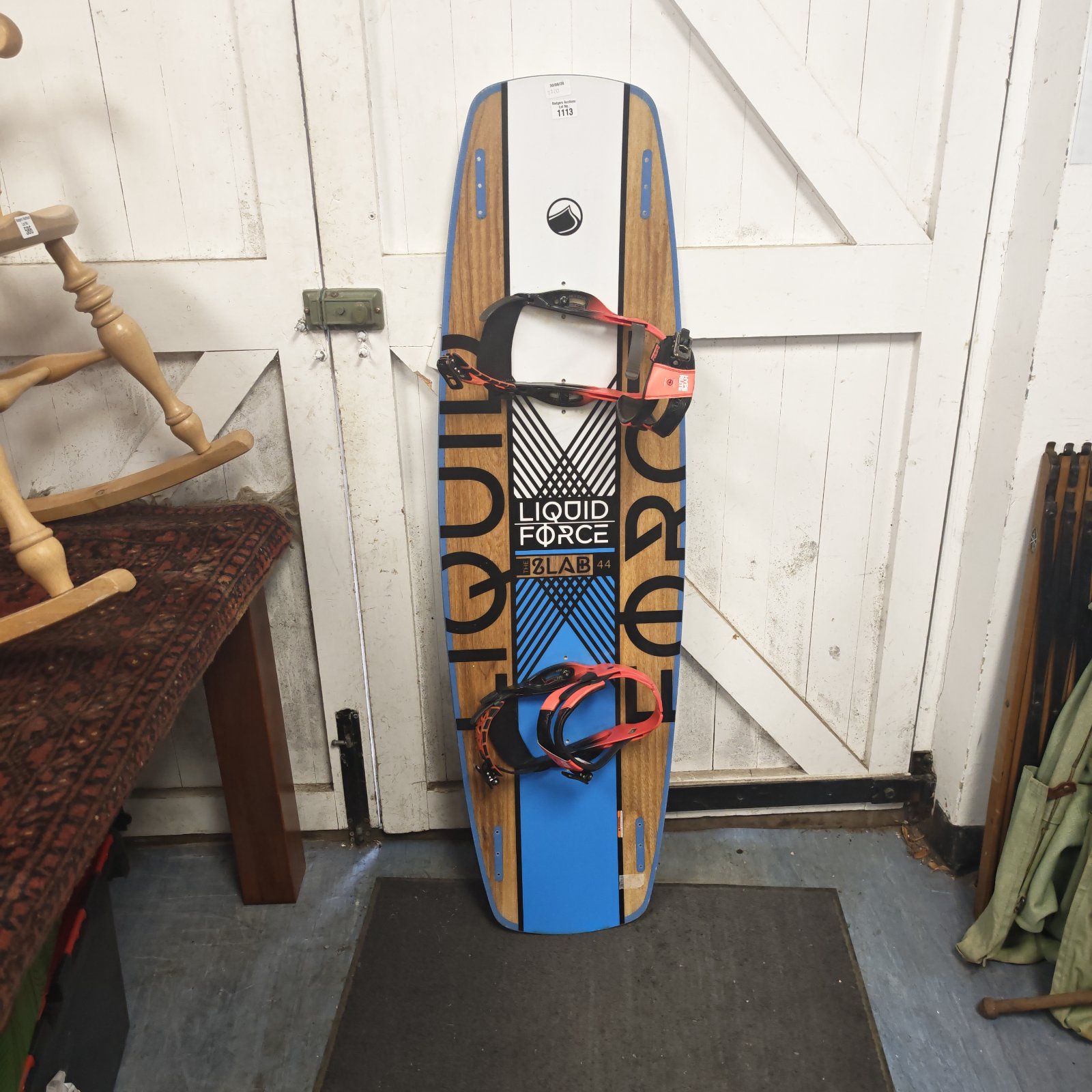 Liquid Force Slab 44 wakeboard in blue and white.
