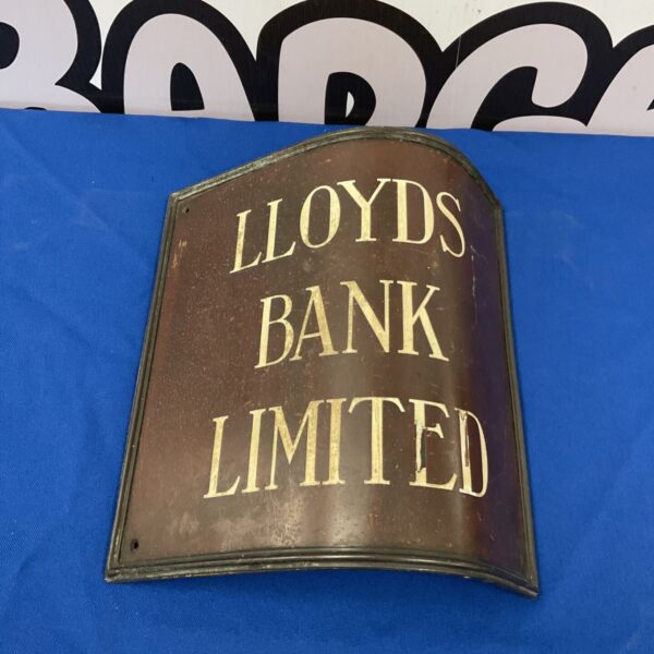 Vintage Lloyds Bank enamel corner sign with white lettering.