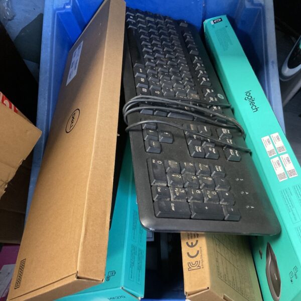 Mixed lot of Logitech, Dell, and HP computer keyboards.
