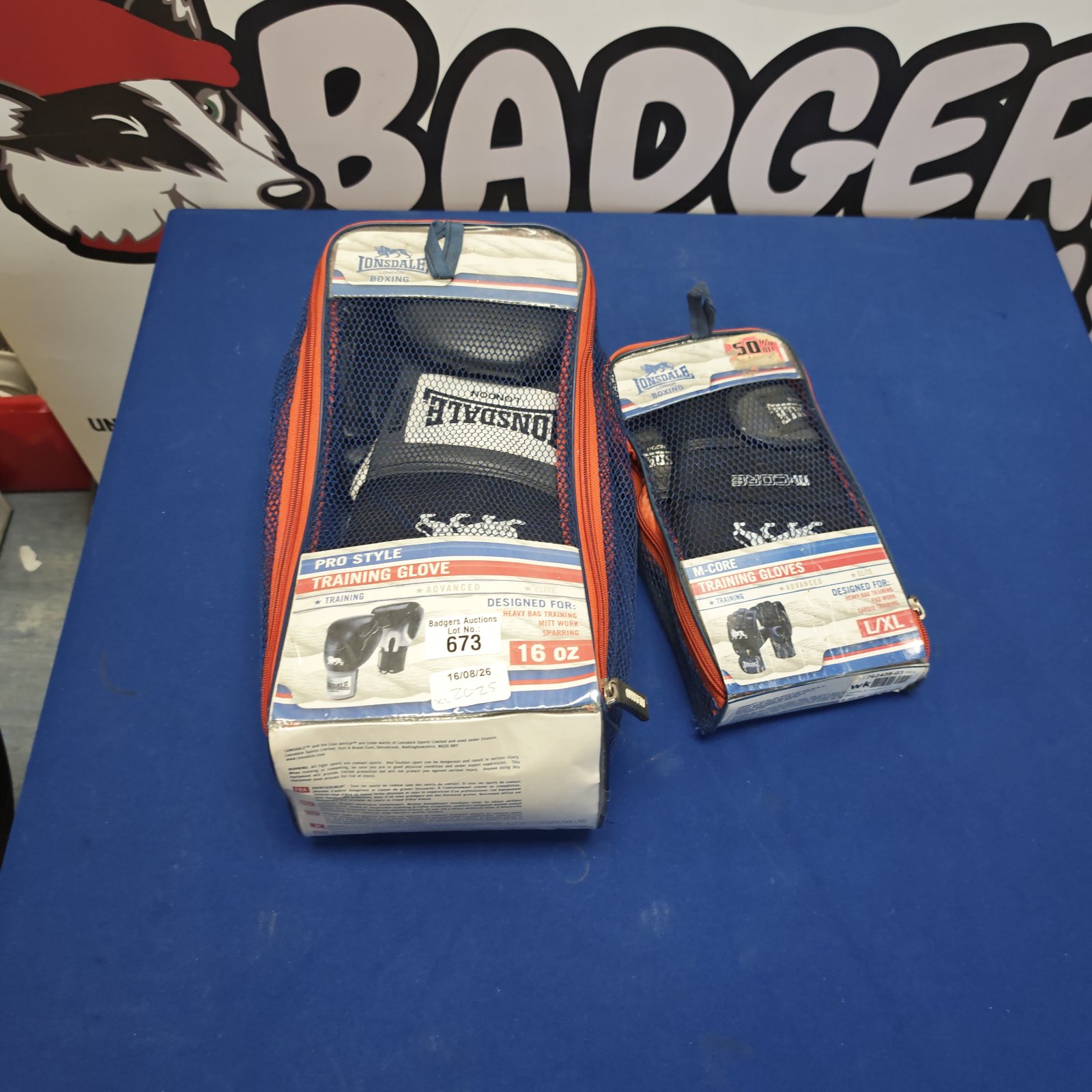 Lonsdale boxing gloves pair, including 16oz pro style gloves.
