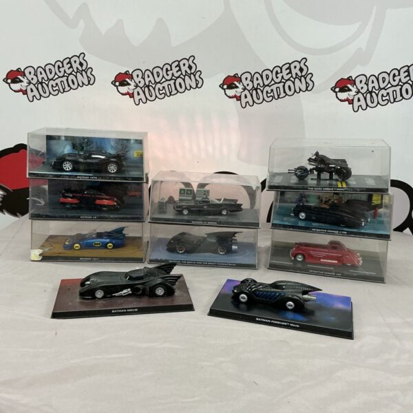 Collection of model Batmobiles from various Batman eras including The Dark Knight, Original Batman TV Series, Detective Comics…