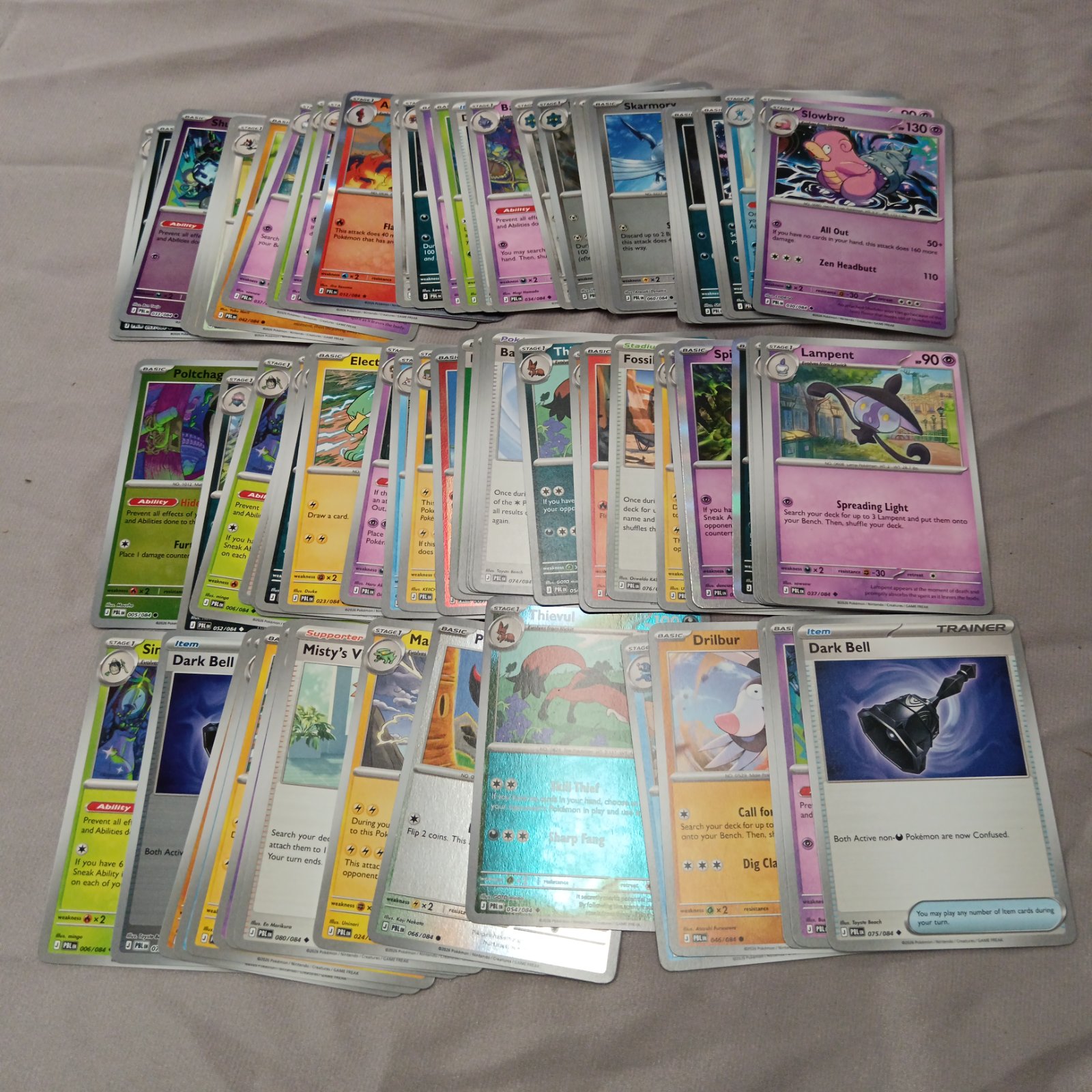 Selection of Pokémon cards including holos