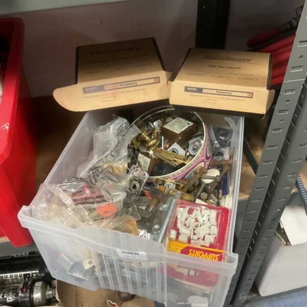 Box of assorted shed clearance items including led tealights & door furniture