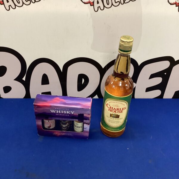 Bottle of Charles House Whisky with three sample bottles