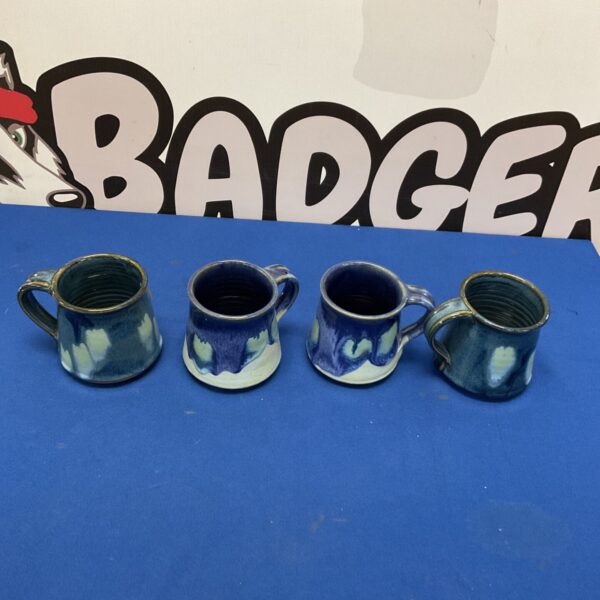 Four handmade studio pottery glazed mugs