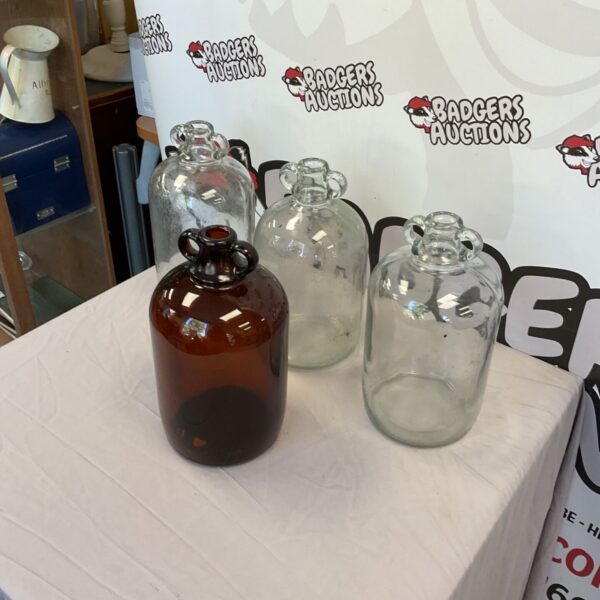 Four Glass Demijohns