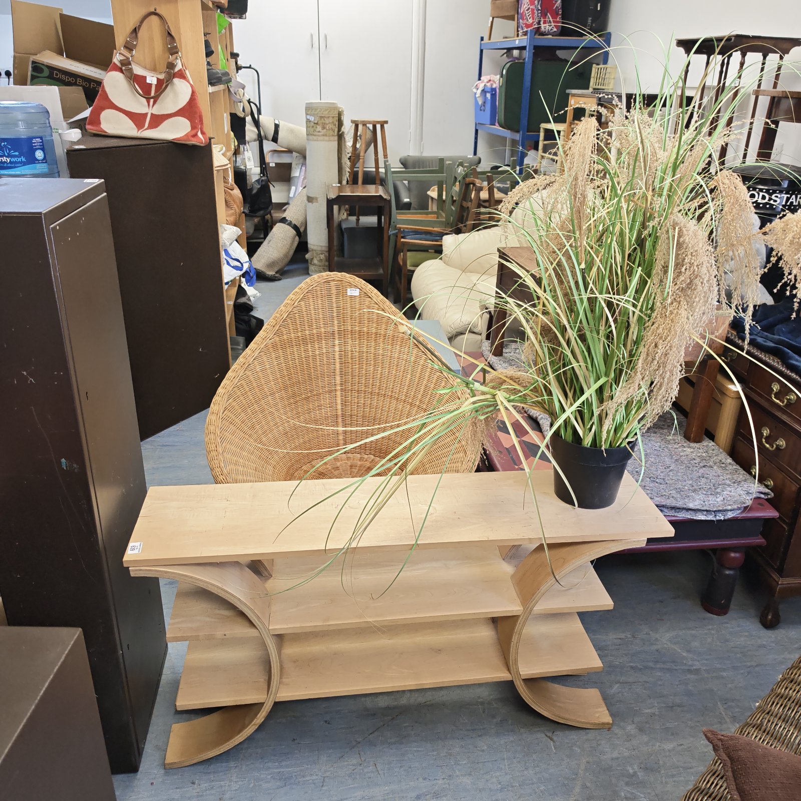 Rattan tulip chair with vintage bentwood table & faux grass plant