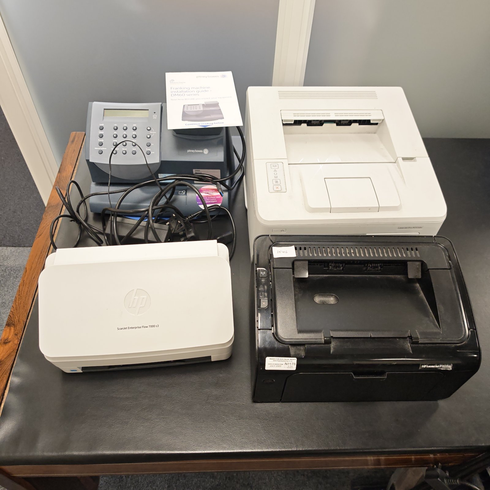 Small bundle of electronics Inc Pitney bowes franking machine & two HP laserjet printers