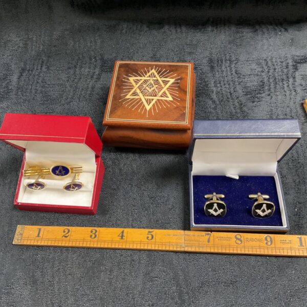 Two pairs masonic cufflinks and tie clip with masonic wood trinket box