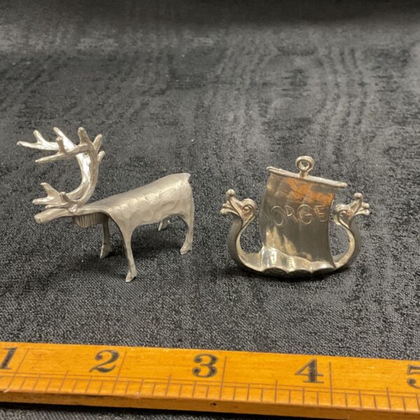 two Scandinavian metal figures with makers marks a Viking long ship and a reindeer
