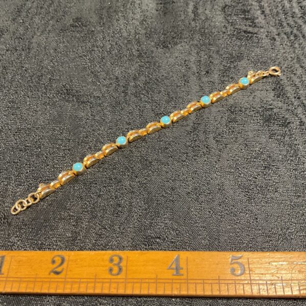 Italian mid century designed modernist bracelet of articulated segments and set with turquoise cabochons 1960s