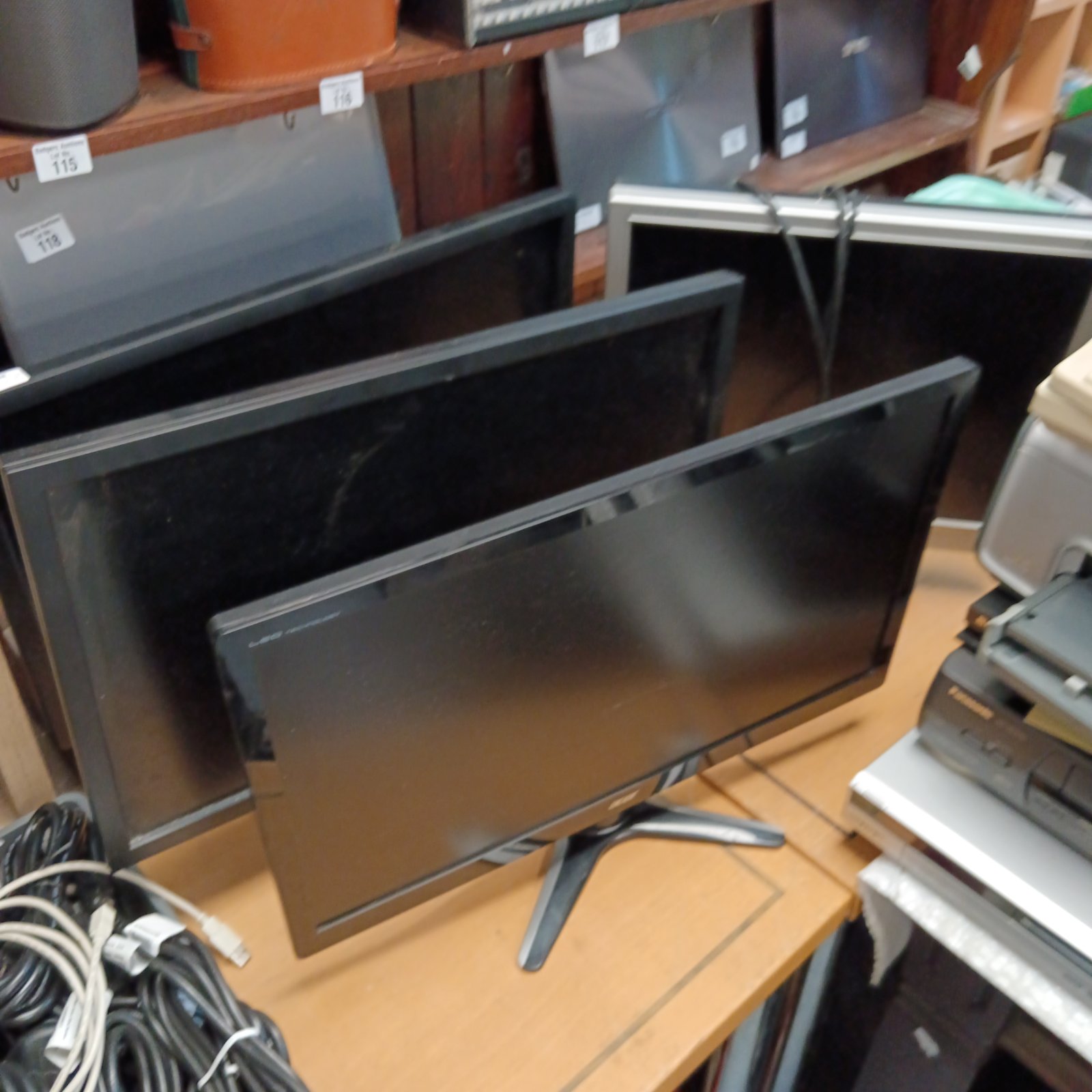 Four computer monitors Inc Dell