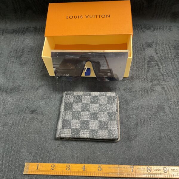 Louis Vuitton sunglasses set with wallet and box.