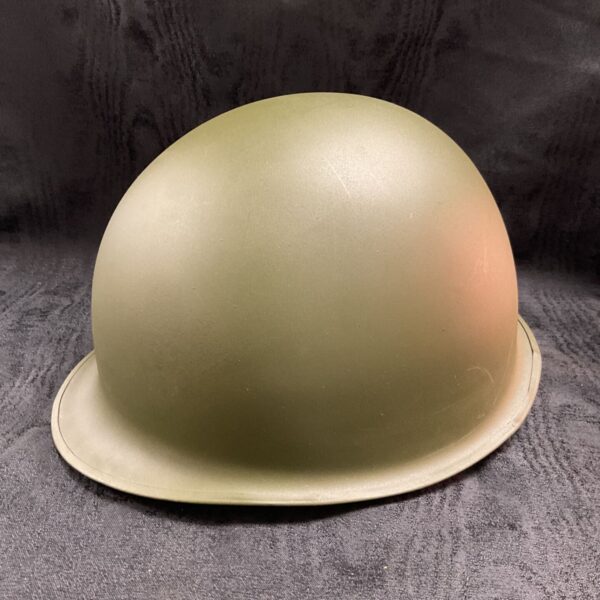 Olive green M1 steel helmet for re-enactment or display.