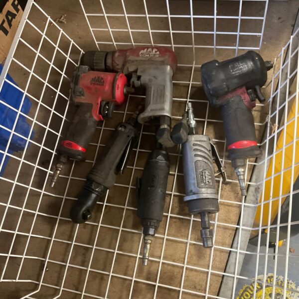 Selection of used Mac Tools air tools for automotive repair.