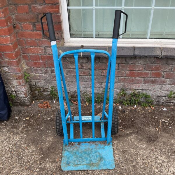 Mac Allister sack barrow for garden use, showing signs of wear.