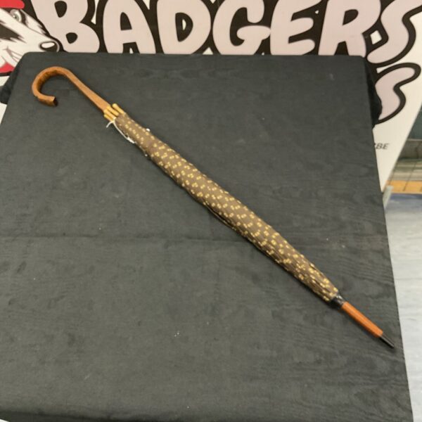 Vintage Mappin and Webb umbrella with patterned canopy and wood handle.