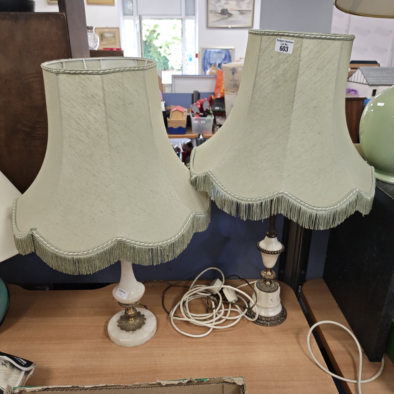 Pair of vintage marble table lamps with cream shades.