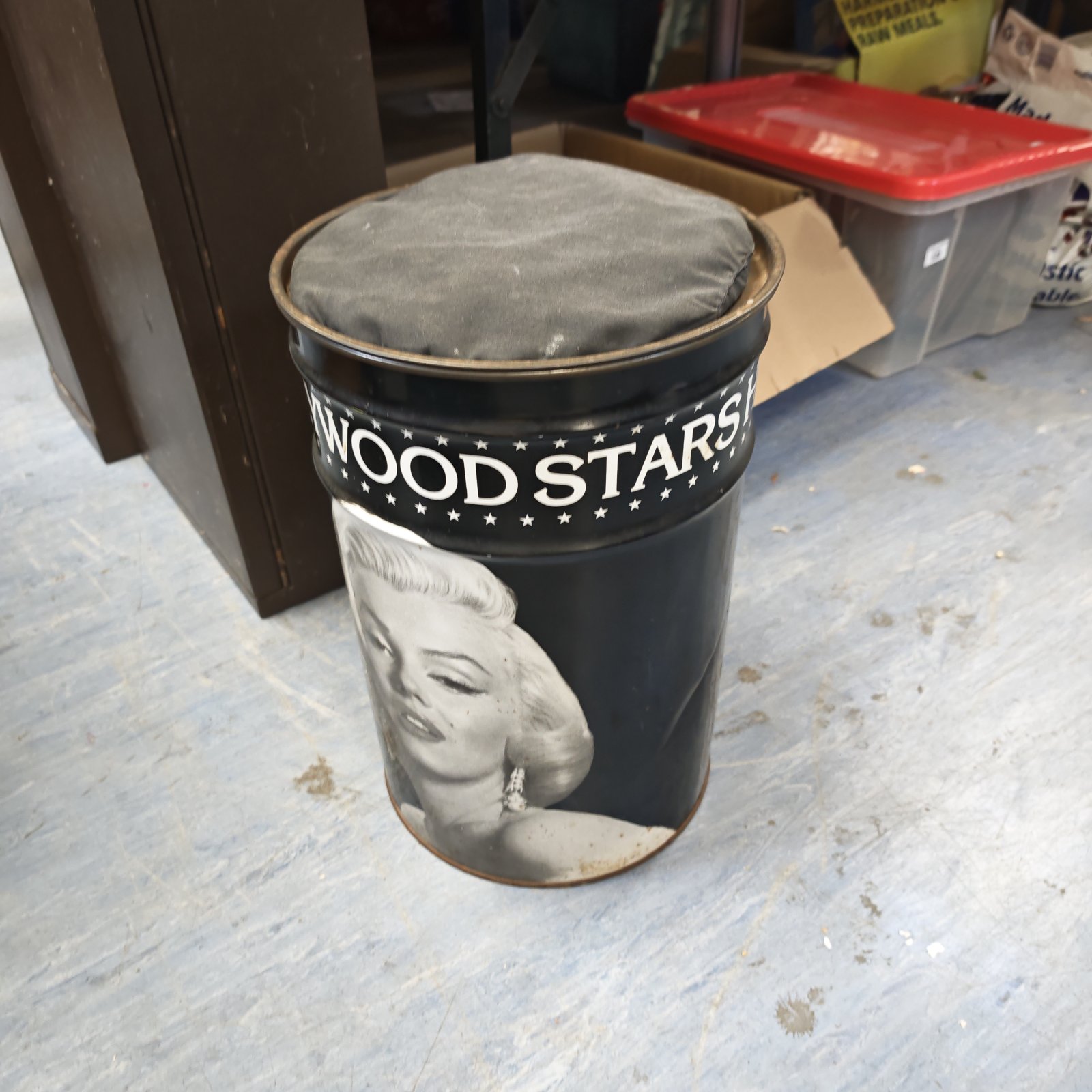 Vintage Marilyn Monroe metal bin, a collectible storage container.