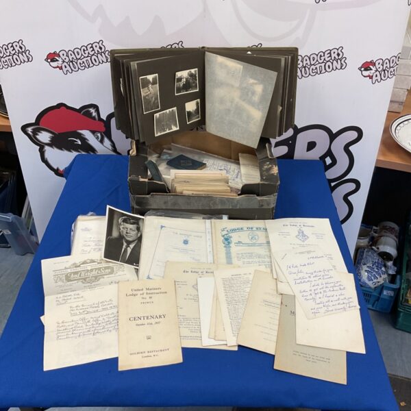 Vintage masonic ephemera collection with documents and a photo album.