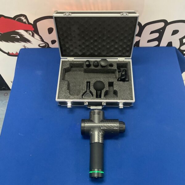 Black massage gun with attachments in a carrying case.