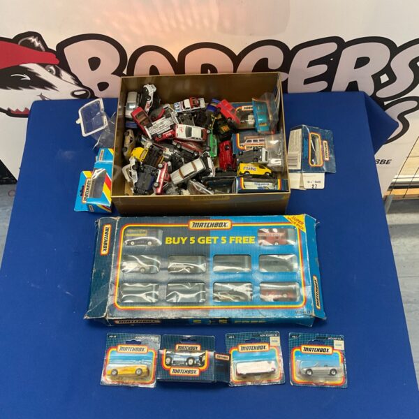 Vintage Matchbox diecast car collection in boxes.
