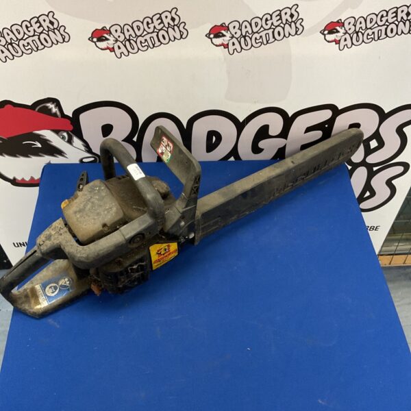 Vintage McCulloch petrol chainsaw in used condition.
