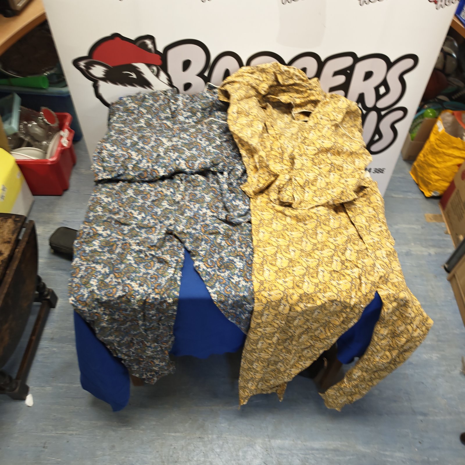 Men's size L pyjama sets with patterned designs.