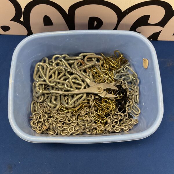 Assorted metal chains and hardware components in a mixed lot.