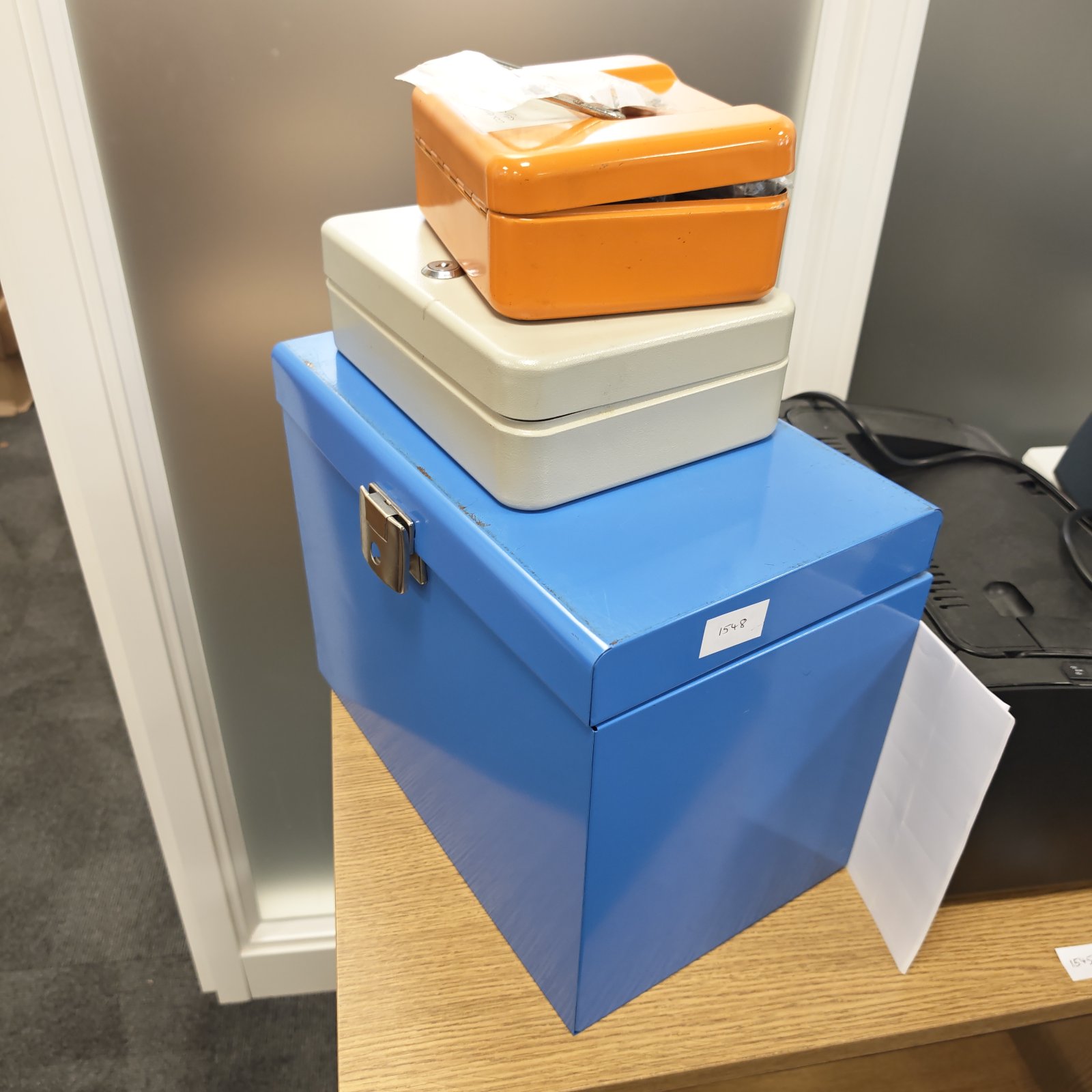 Vintage metal lock boxes and filing box for storage.