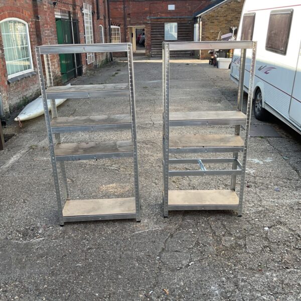 Freestanding metal shelving unit for garage or workshop storage.