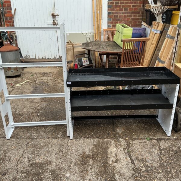 Metal van shelves for tool storage and organisation.