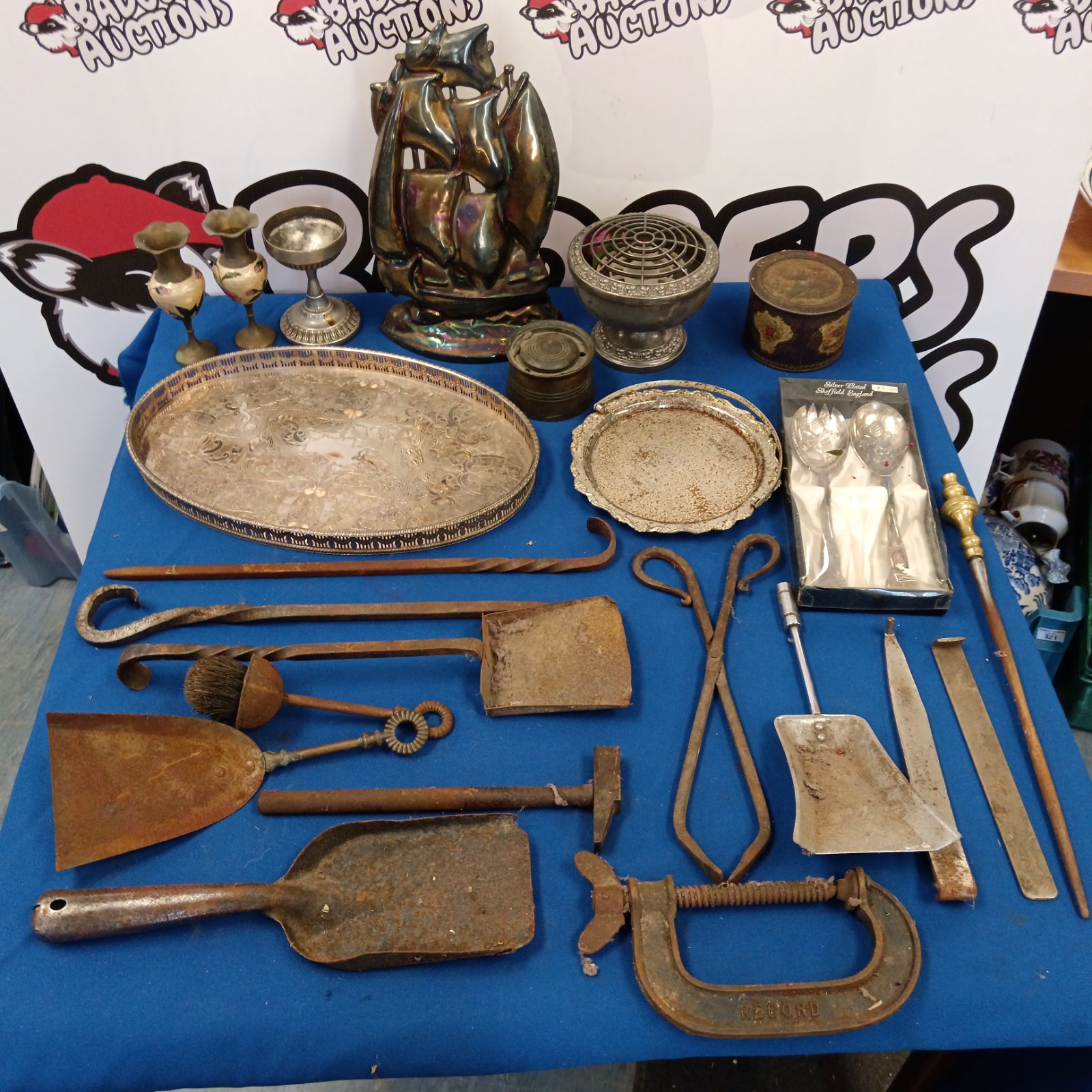 Vintage metalware lot including silver plate and fireplace tools.