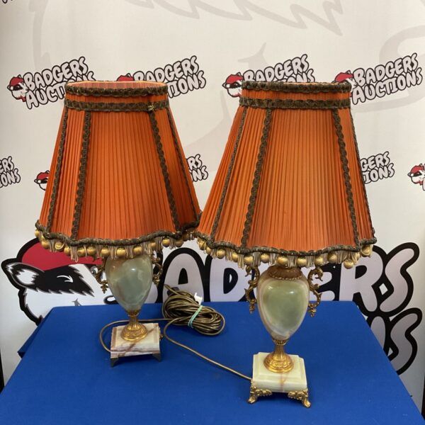 Pair of mid-century Italian table lamps with orange shades.