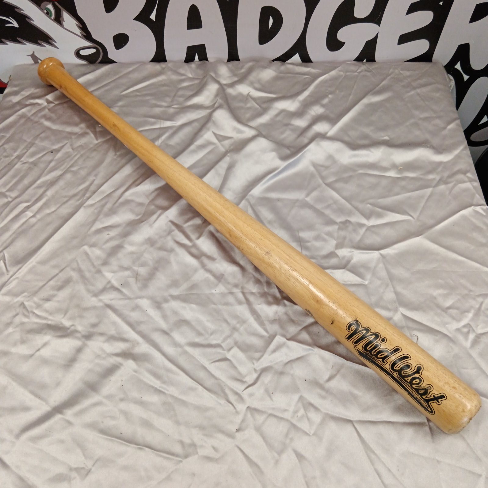 Midwest wooden baseball bat for sports and training.