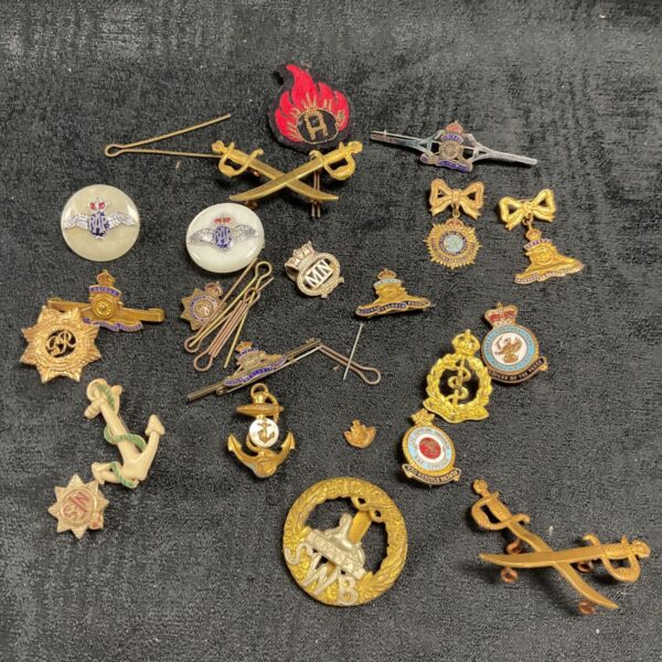 Vintage military sweetheart brooches and badges collection from WW1 and WW2.
