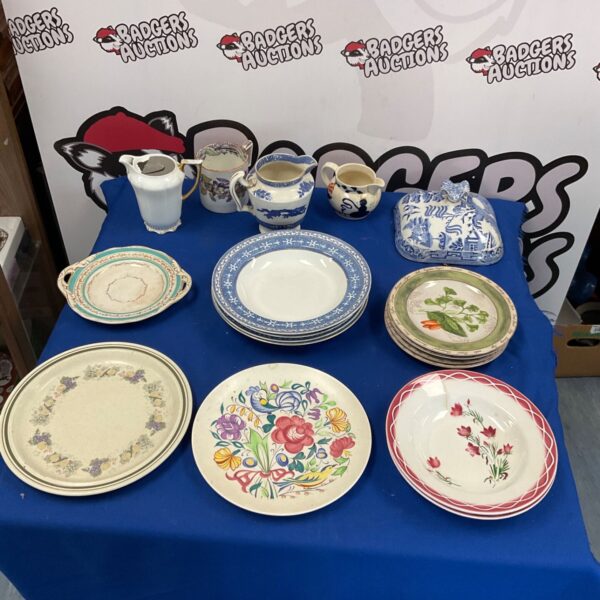 Mixed china and porcelain lot including Poole Pottery and Royal Doulton plates.