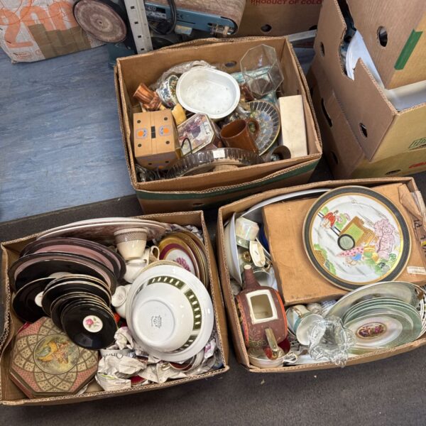Mixed chinaware lot with boxes of vintage plates and bowls.