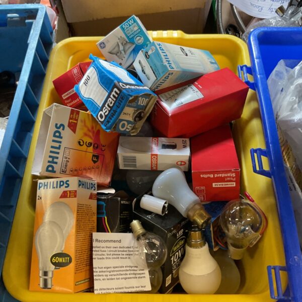 Mixed lot of Philips and Osram light bulbs in boxes.